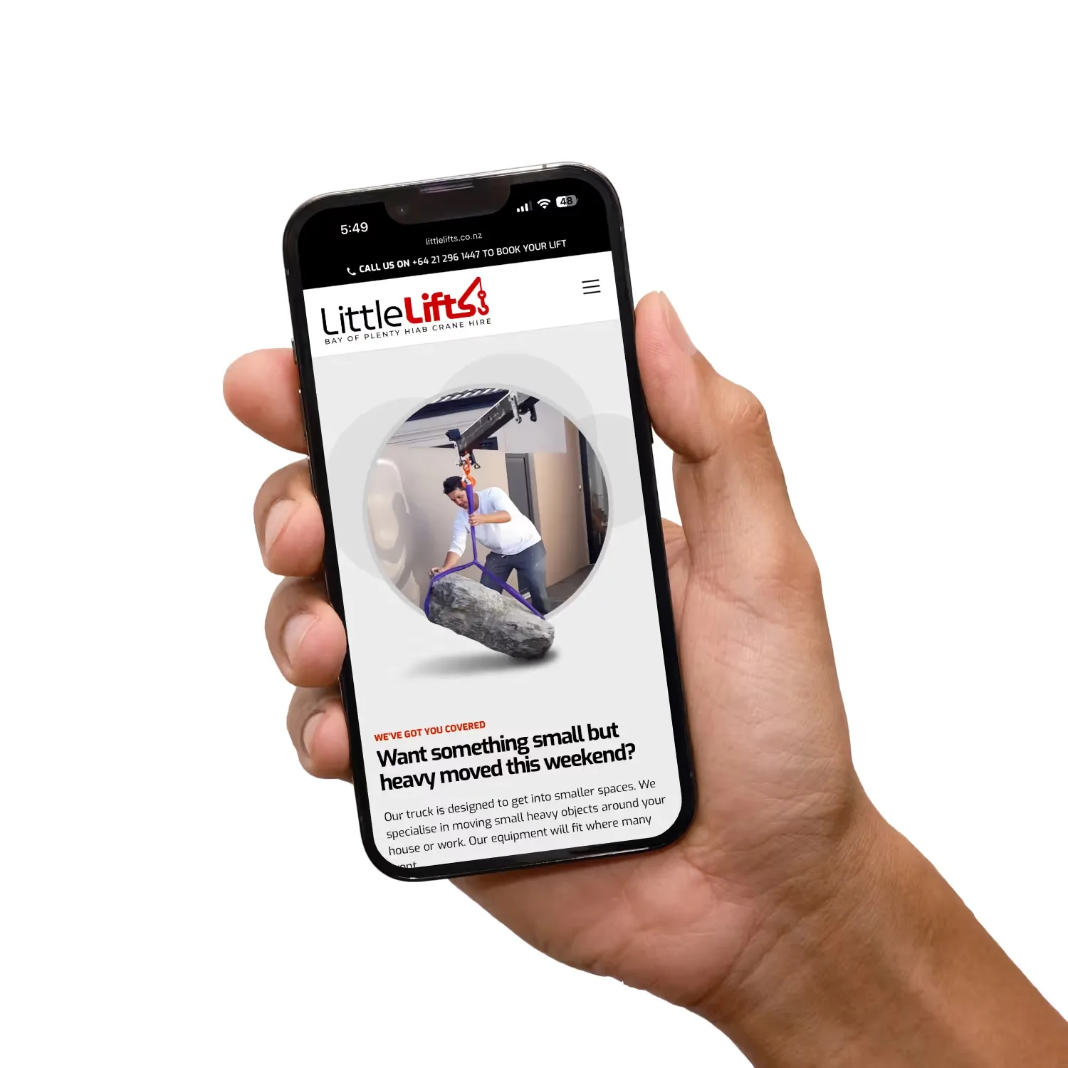 Hands holding iPhone with little lifts website.