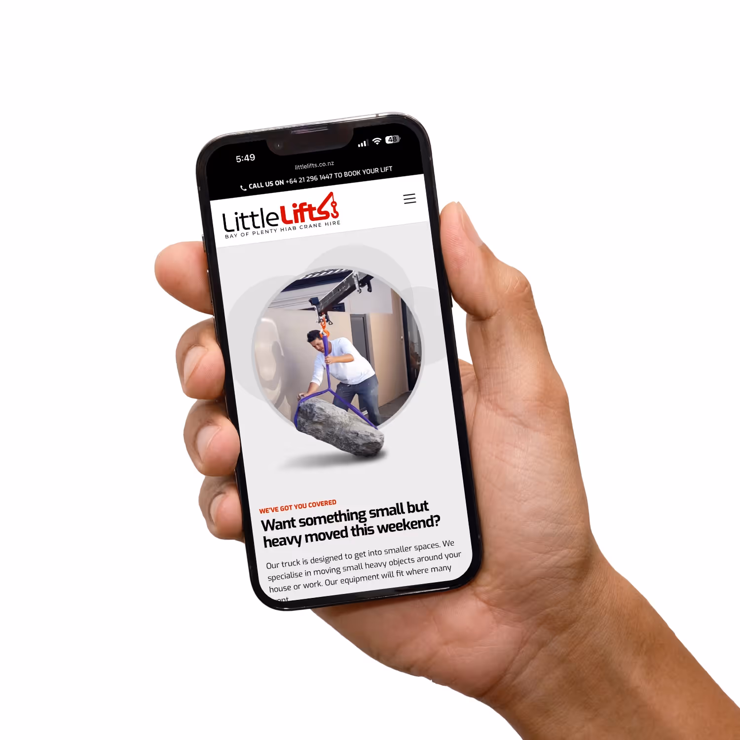 Hands holding iPhone with little lifts website.